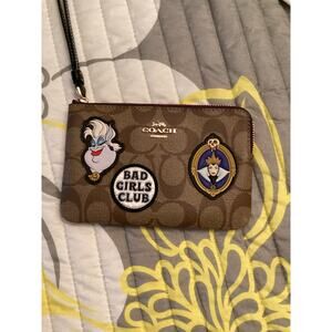 NWOT Disney x Coach Corner Zip Wristlet Signature Canvas with Bad Girls Patches